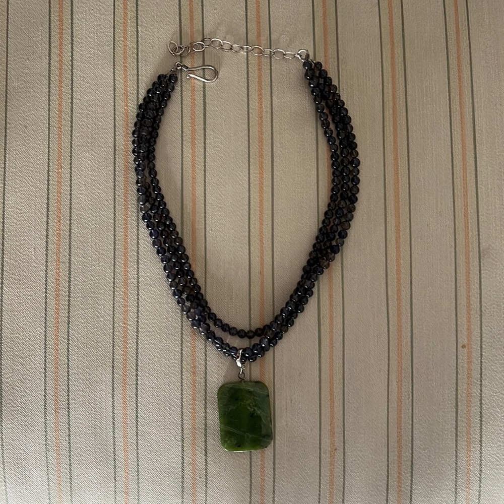 Amethyst 3 strand necklace w/Jade pendant.